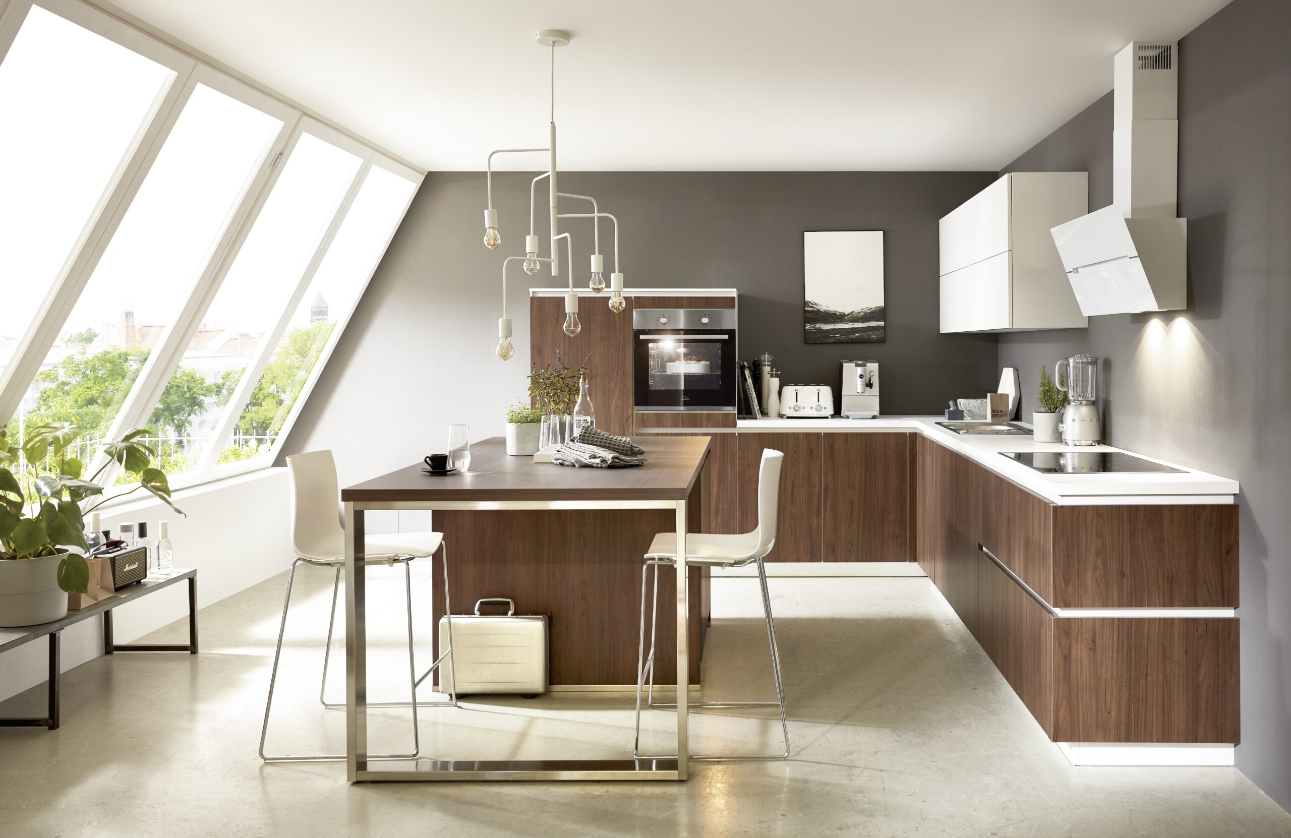 A renovation done right — this walnut and white kitchen shows what's possible when you find the right contractor for the job.