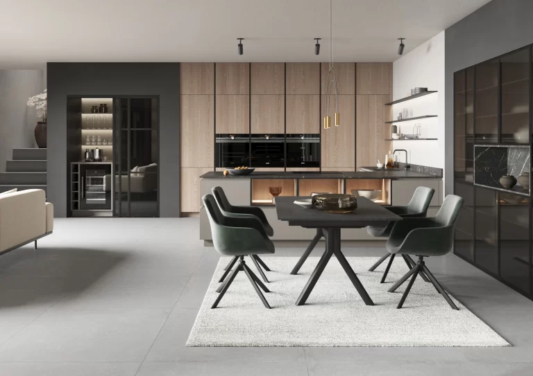 Layout is everything — this open-plan kitchen maximises every zone, from the oak cabinet wall with integrated appliances to the smoked glass display tower and the seamlessly connected dining area.